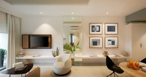 Television mounted flush to a living room wall